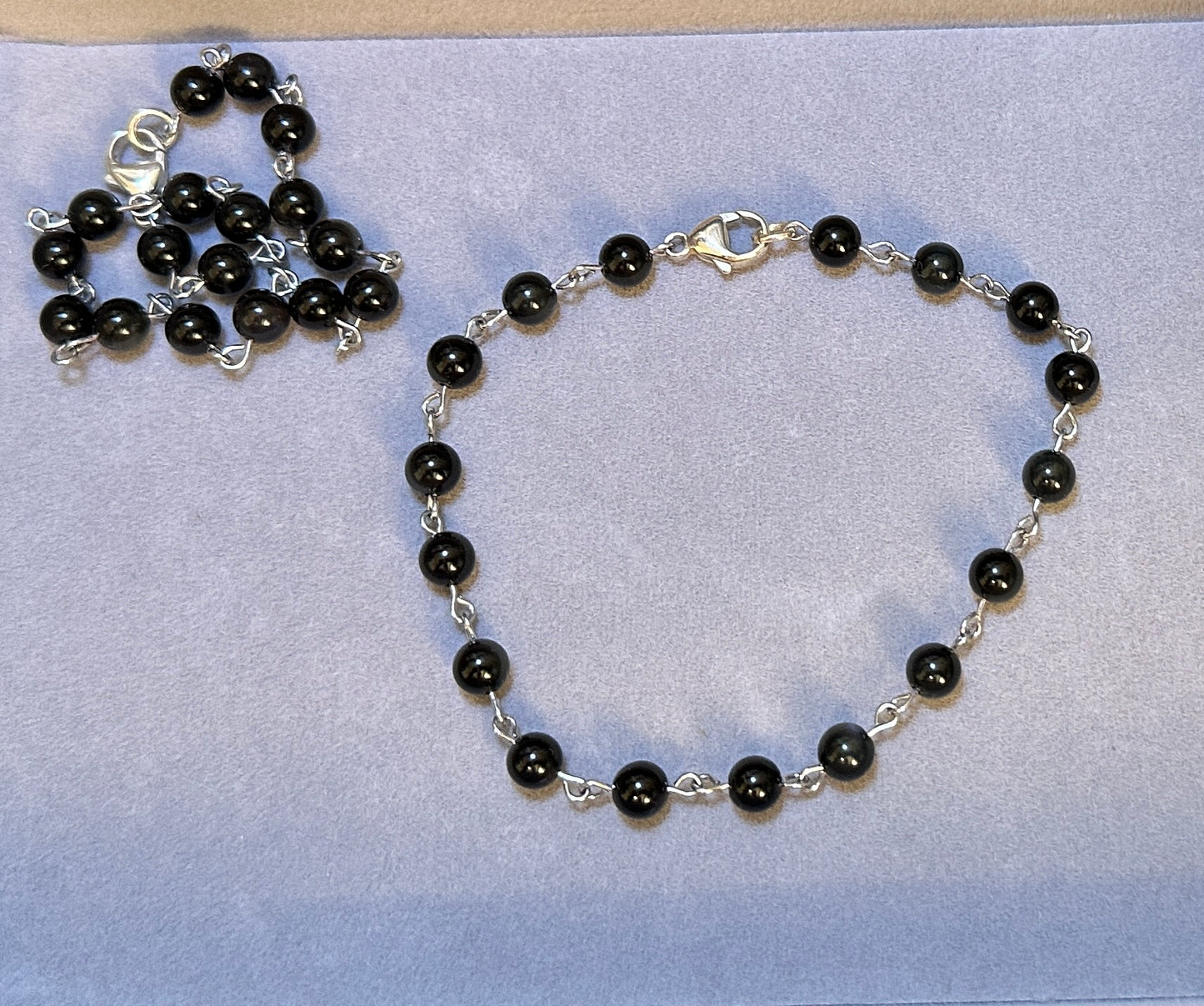 Black Obsidian A+ Bead with Tibetan Charm Spacer Stretchy Bracelet