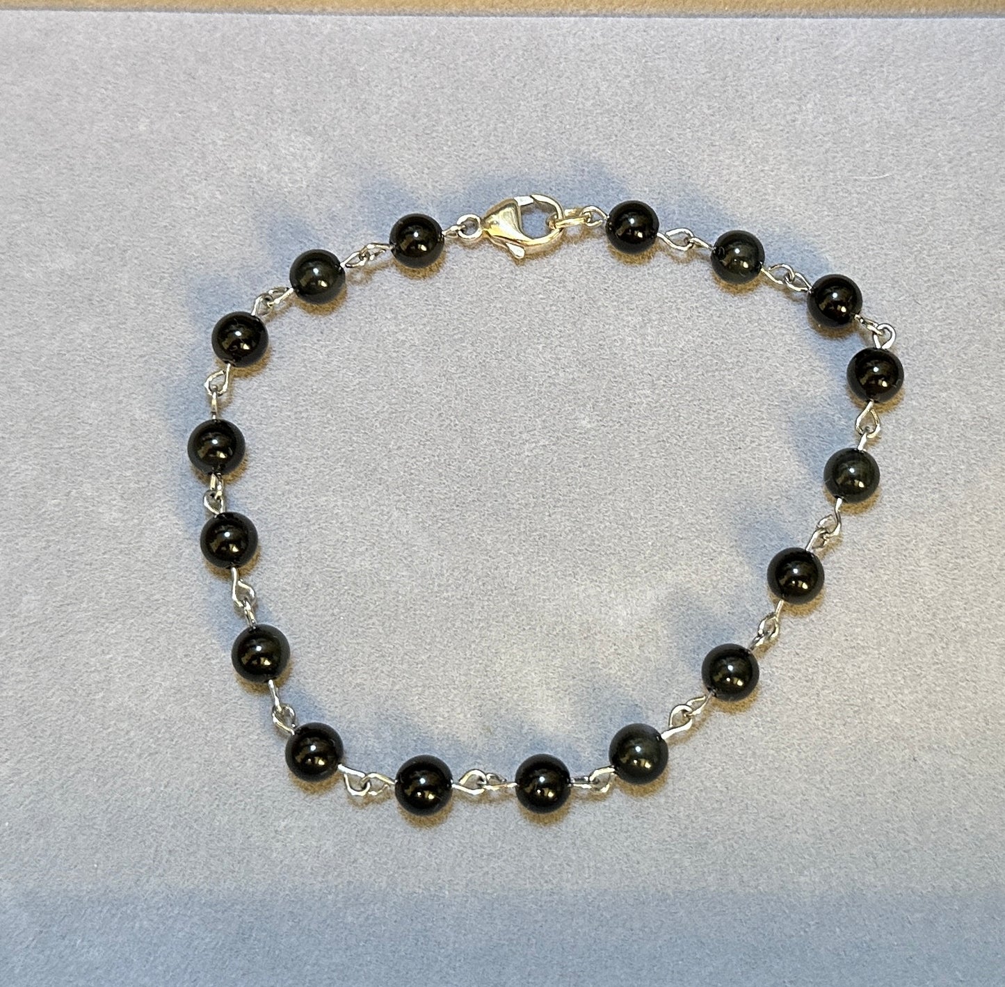 Black Obsidian A+ Bead with Tibetan Charm Spacer Stretchy Bracelet